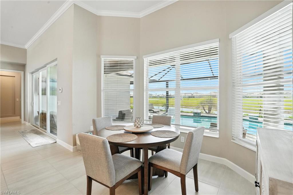 15027 Longs Lane Babcock Ranch, FL 33982 - Photo 20 of 50 a view of a dining room with furniture window and outside view
