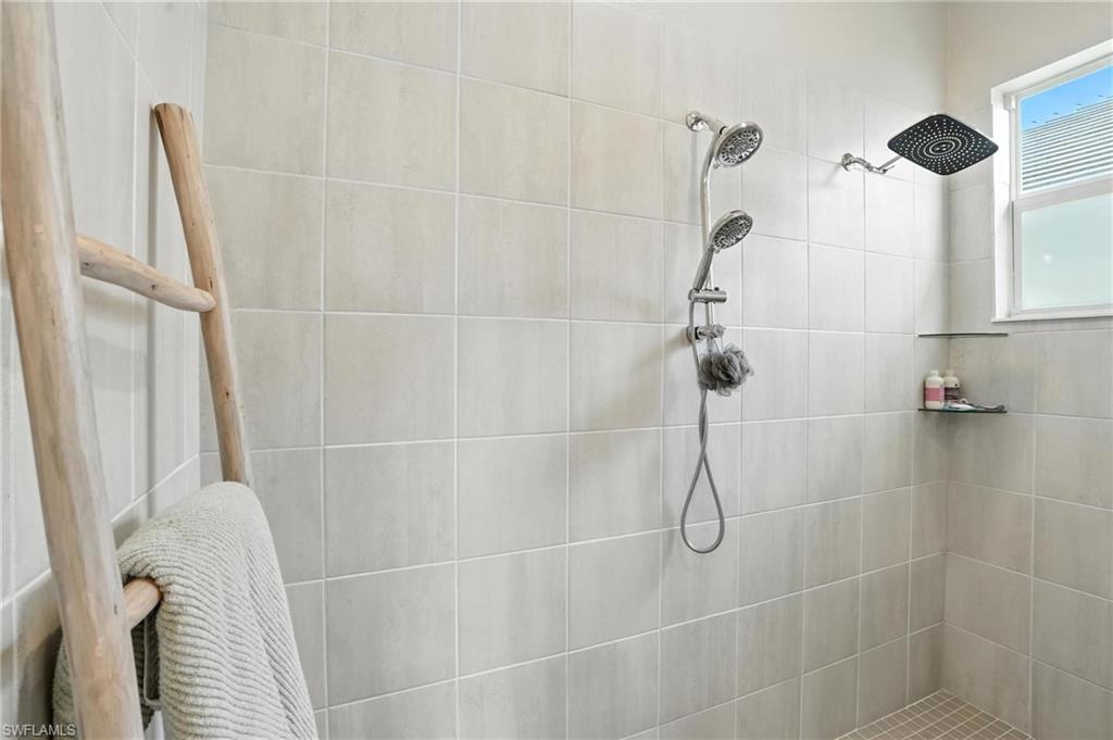 15027 Longs Lane Babcock Ranch, FL 33982 - Photo 29 of 50 a bathroom with a shower