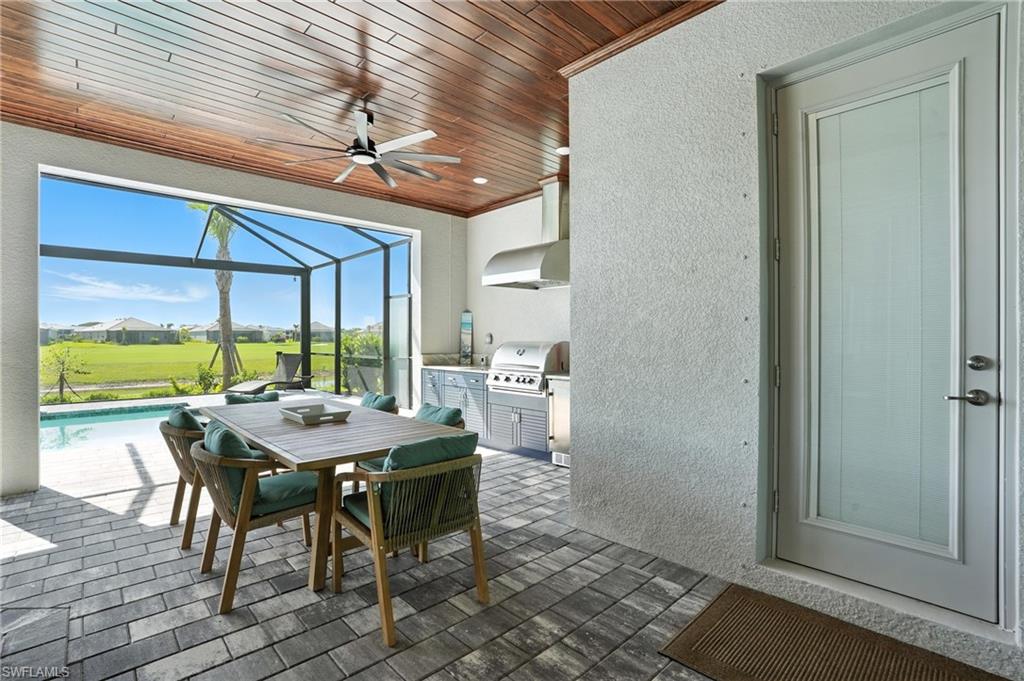 15027 Longs Lane Babcock Ranch, FL 33982 - Photo 40 of 50 a view of a dining room with furniture window and outside view