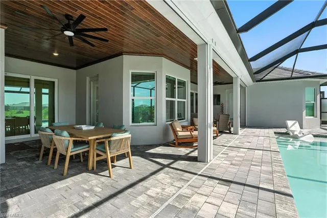 a outdoor living space with furniture and a large window