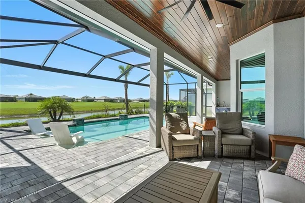 a outdoor space with patio the couches and a dining table with the view of the balcony