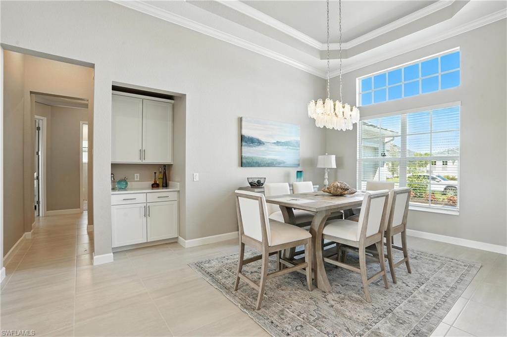 15027 Longs Lane Babcock Ranch, FL 33982 - Photo 6 of 50 a dining room with furniture and window