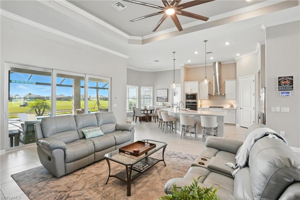 15027 Longs Lane Babcock Ranch, FL 33982 - Photo 9 of 50 a living room with furniture and a large window