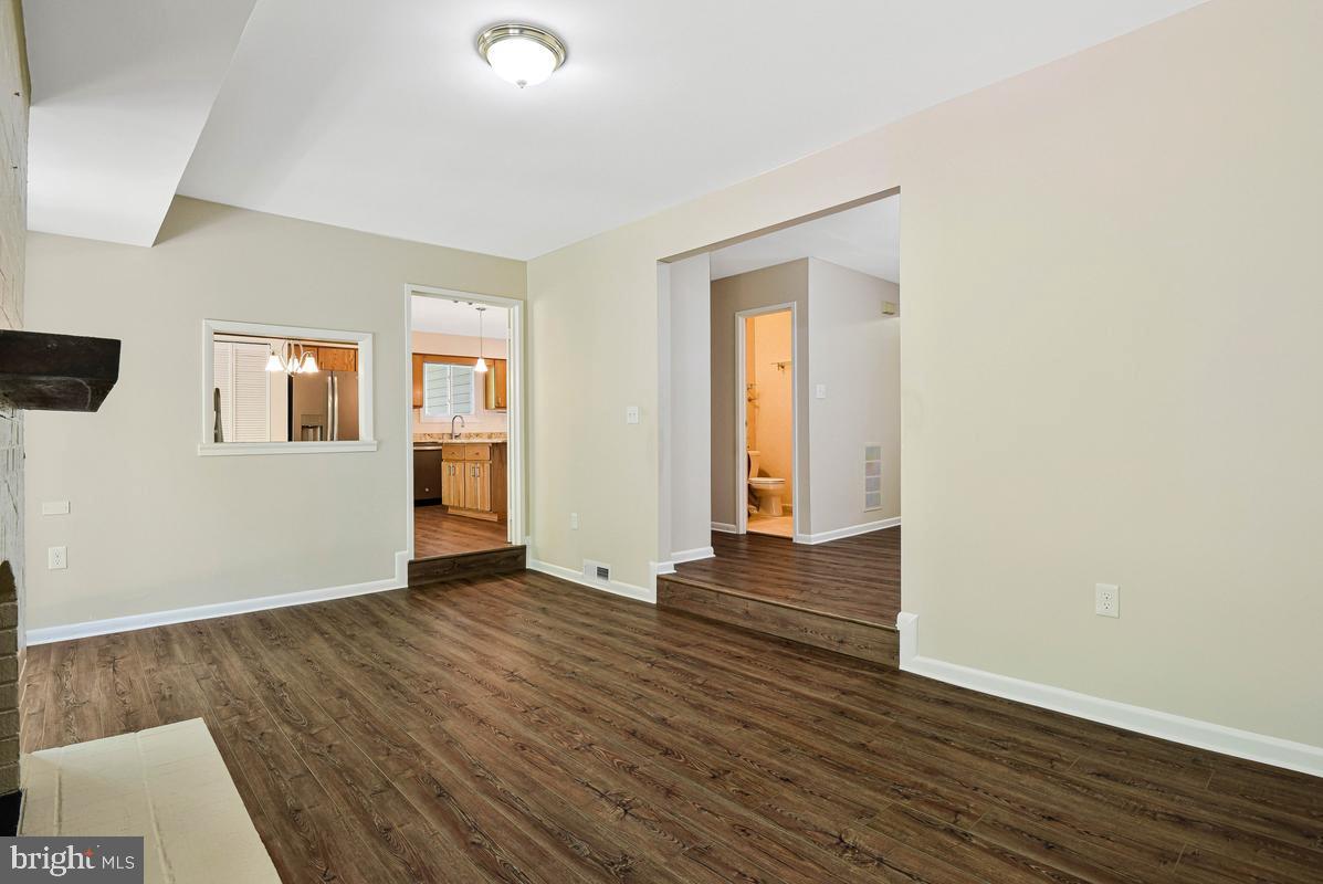 11814 Blue Spruce Road Reston, VA 20191 - Photo 16 of 56 Family room with peek through to kitchen