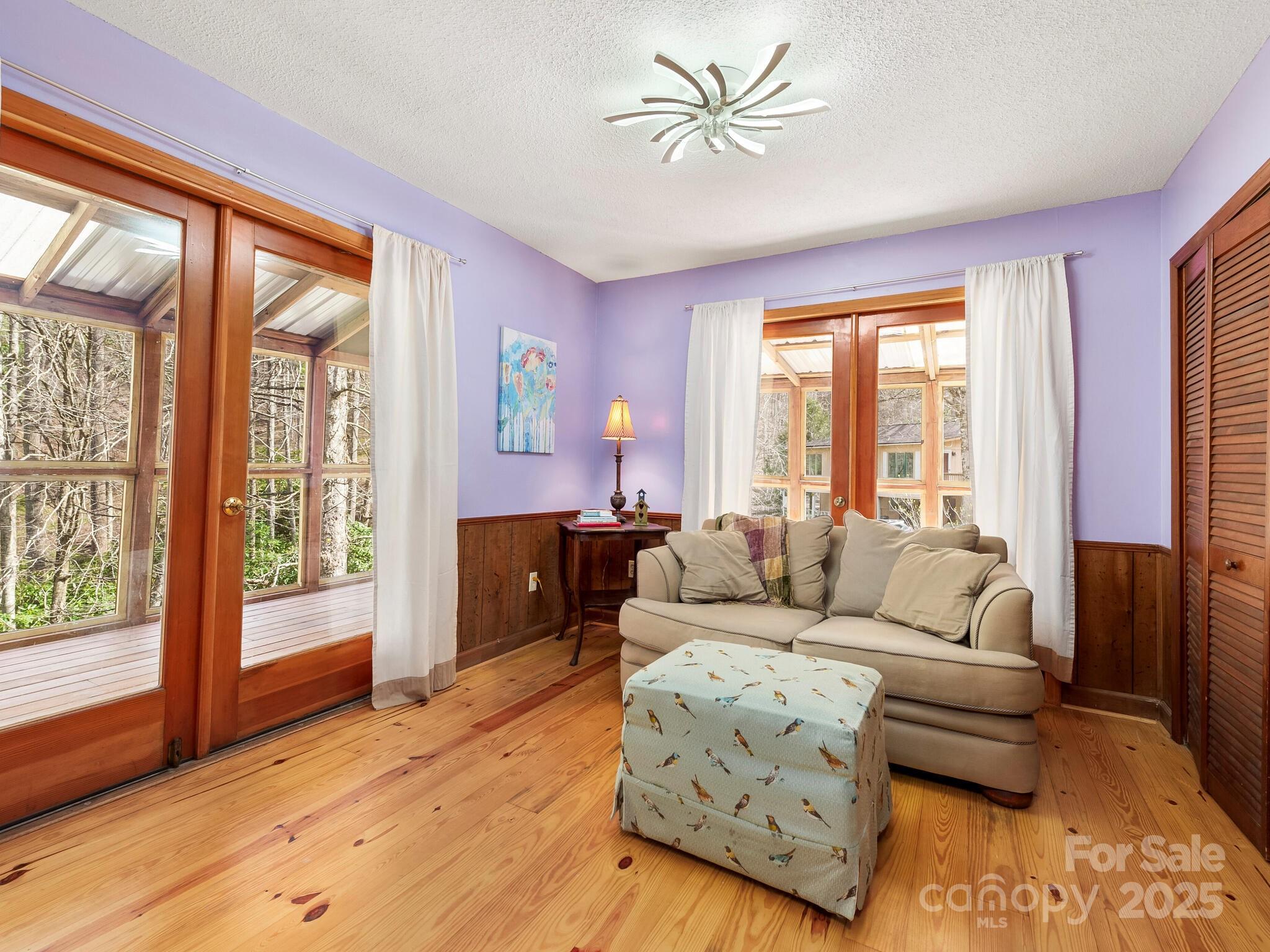 70 Fox Run Hot Springs, NC 28743 - Photo 16 of 29 a living room with furniture and a large window