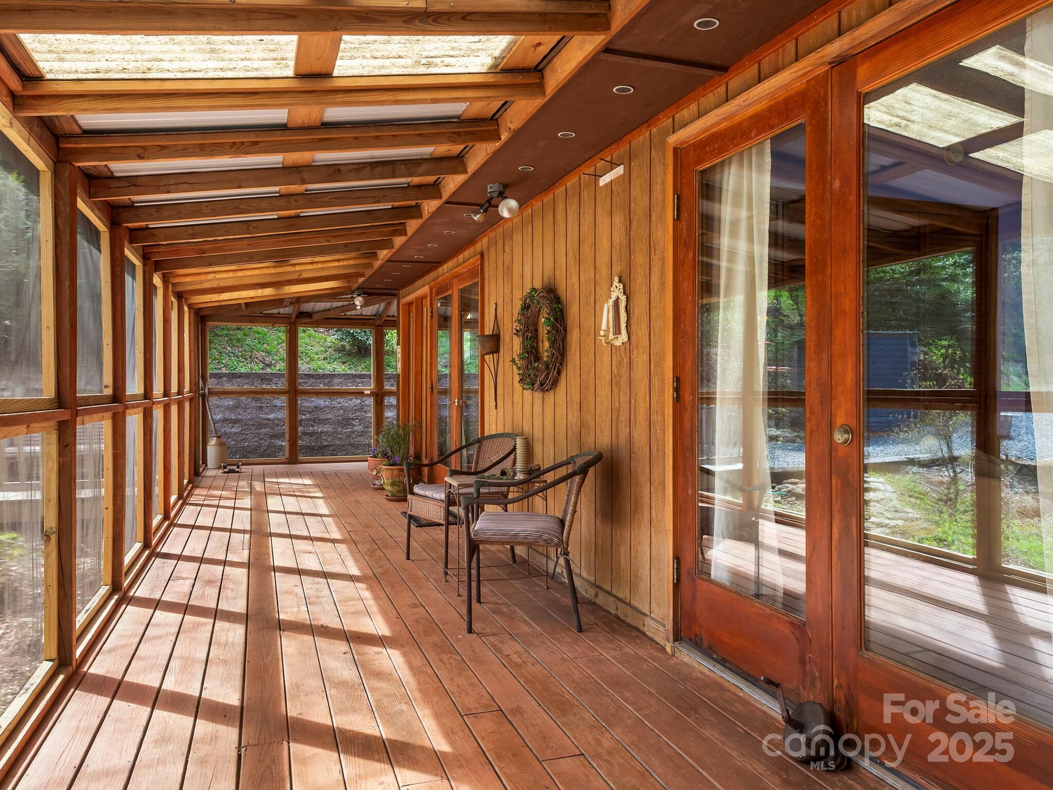 70 Fox Run Hot Springs, NC 28743 - Photo 21 of 29 a view of balcony with wooden floor