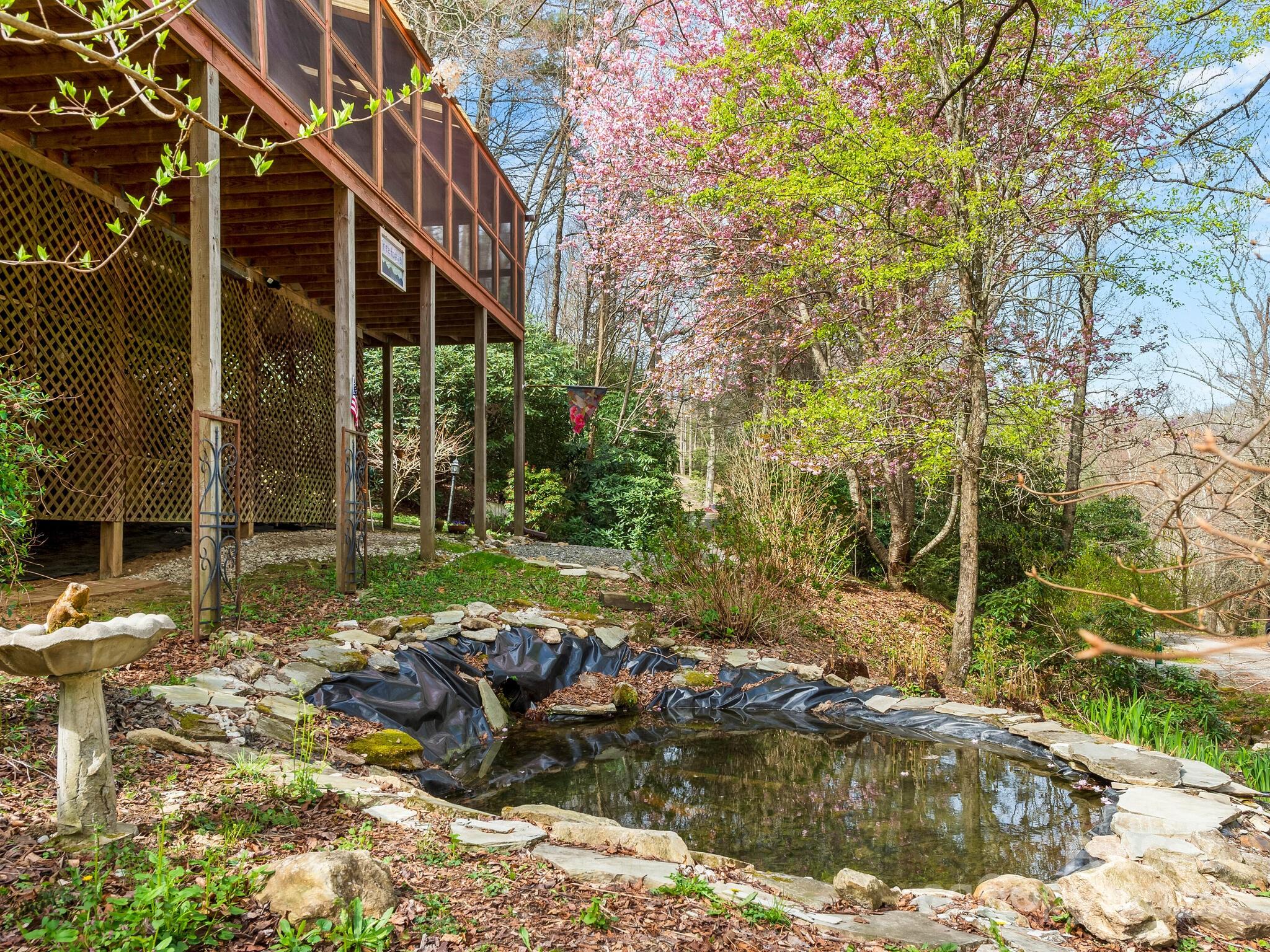 70 Fox Run Hot Springs, NC 28743 - Photo 24 of 29 a view of a house with backyard and sitting area