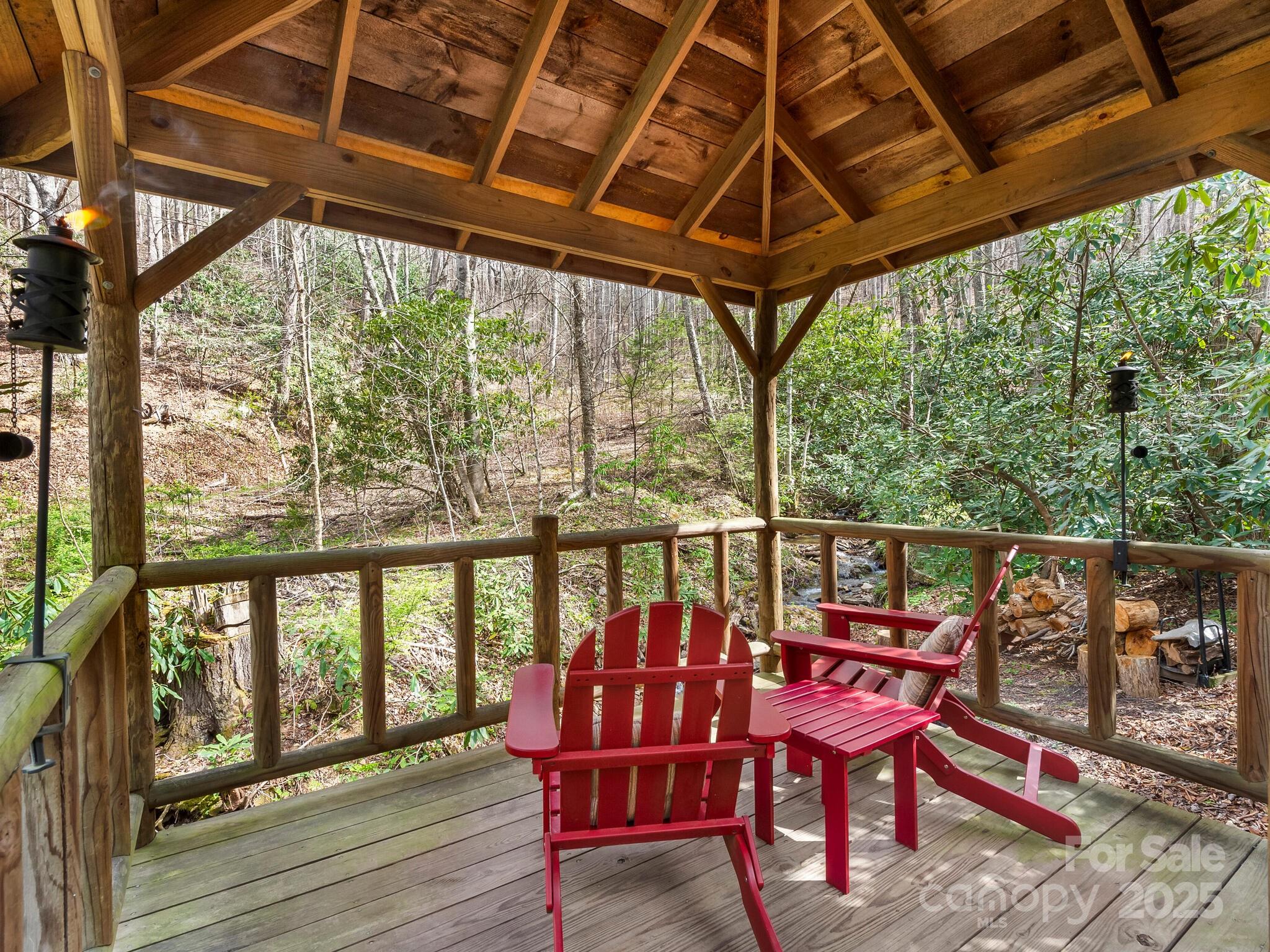 70 Fox Run Hot Springs, NC 28743 - Photo 26 of 29 a view of a chairs and table in the balcony