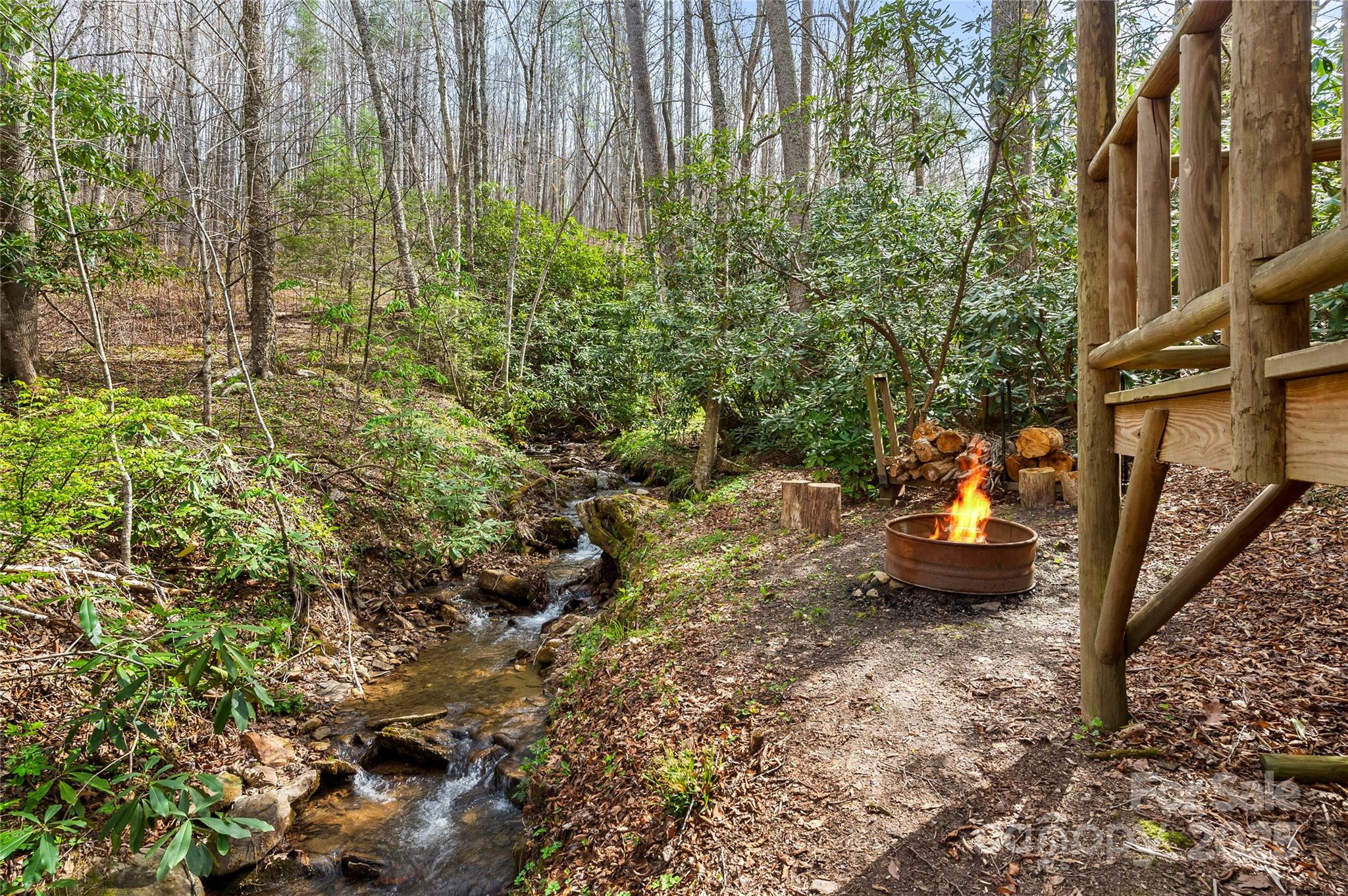 70 Fox Run Hot Springs, NC 28743 - Photo 27 of 29 a view of a backyard with swimming pool and sitting area