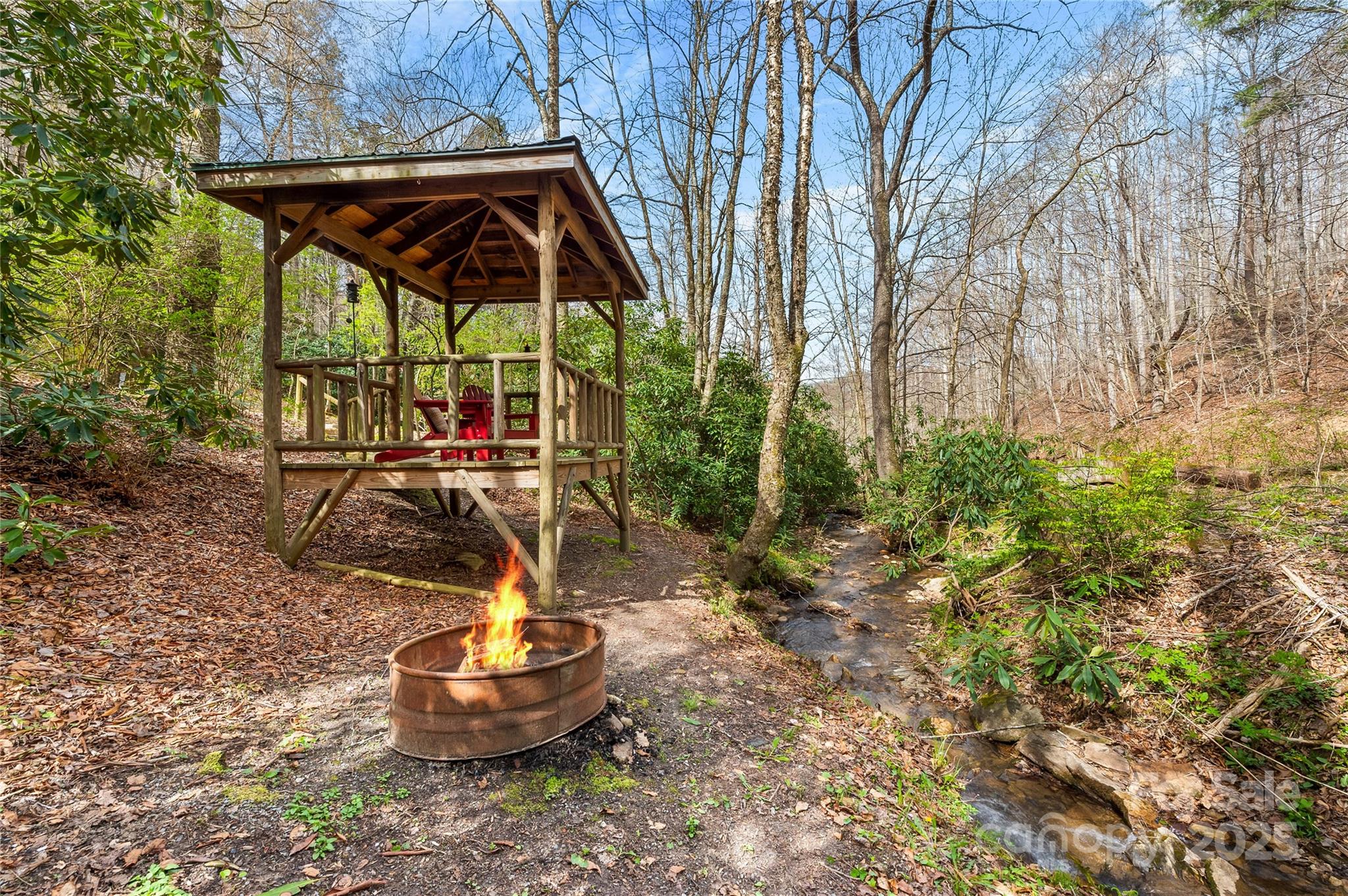 70 Fox Run Hot Springs, NC 28743 - Photo 28 of 29 a view of a chair and tables in the backyard