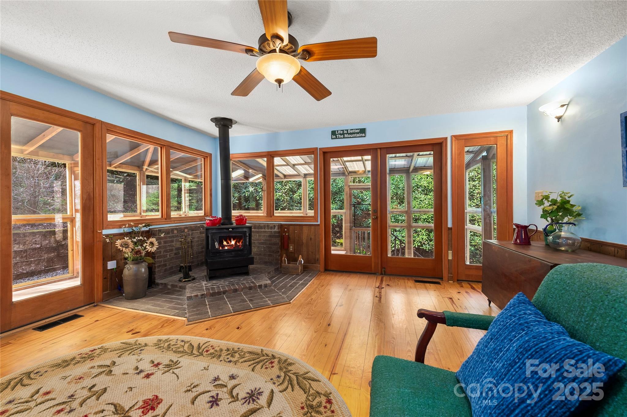 70 Fox Run Hot Springs, NC 28743 - Photo 5 of 29 a bedroom with furniture and a large window