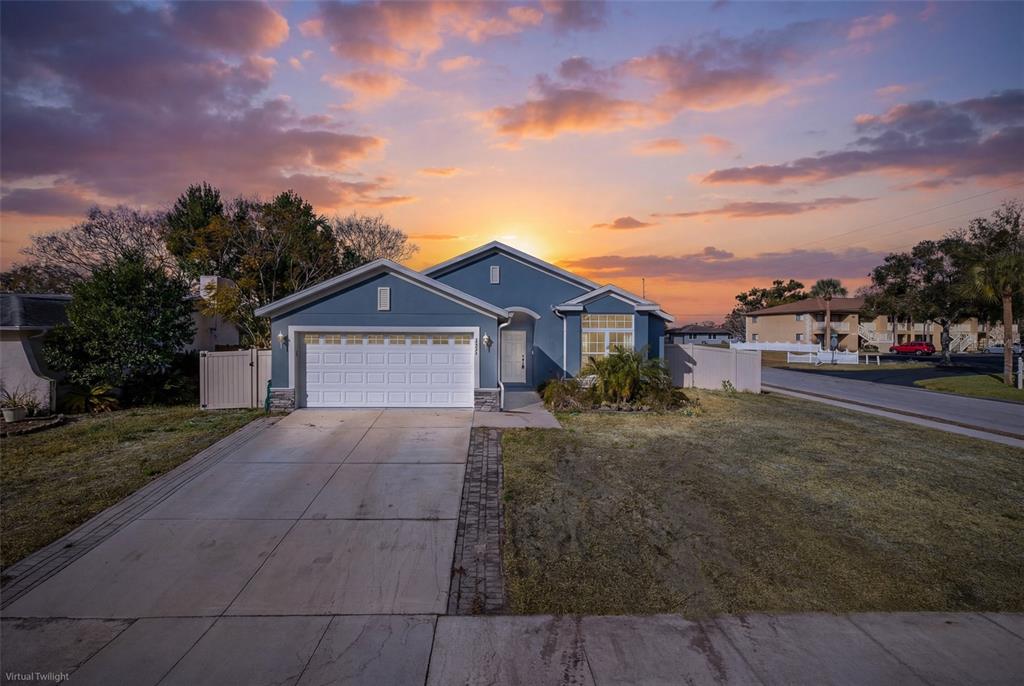 6823 Crossbow Lane New Port Richey, FL 34653 - Photo 3 of 25 a view of house with outdoor space and street view