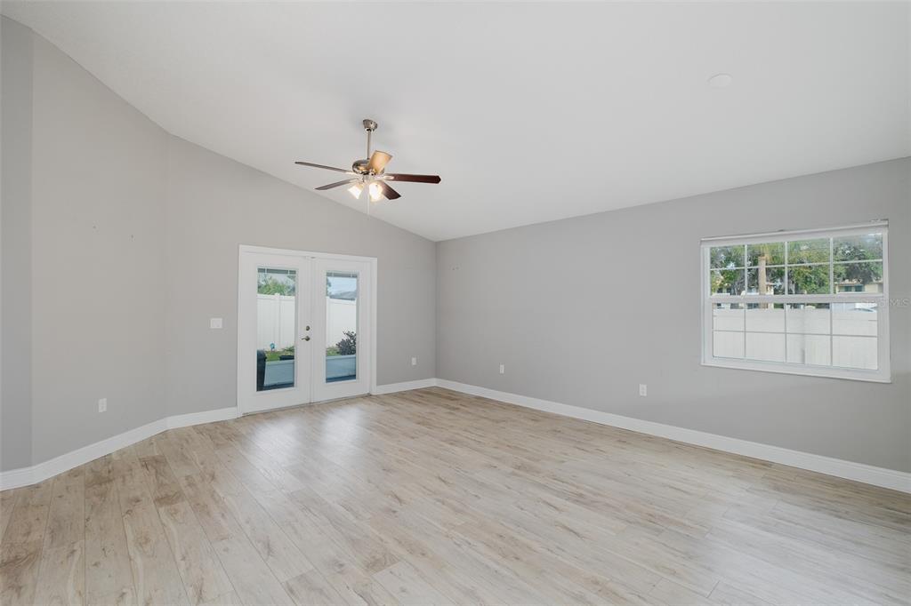 6823 Crossbow Lane New Port Richey, FL 34653 - Photo 10 of 25 a view of an empty room with a window