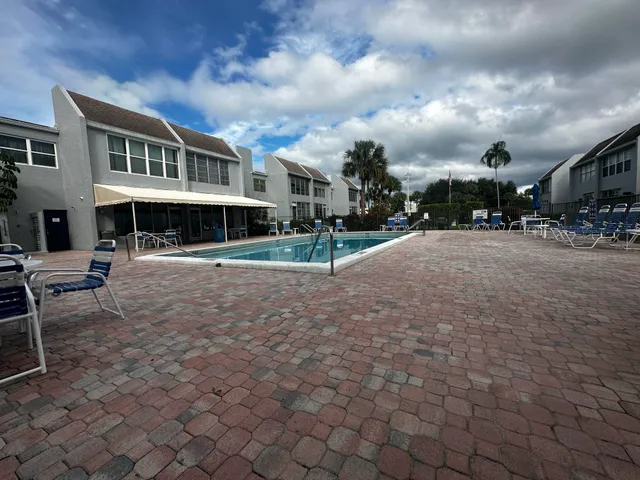 a view of a town with brick building and many windows