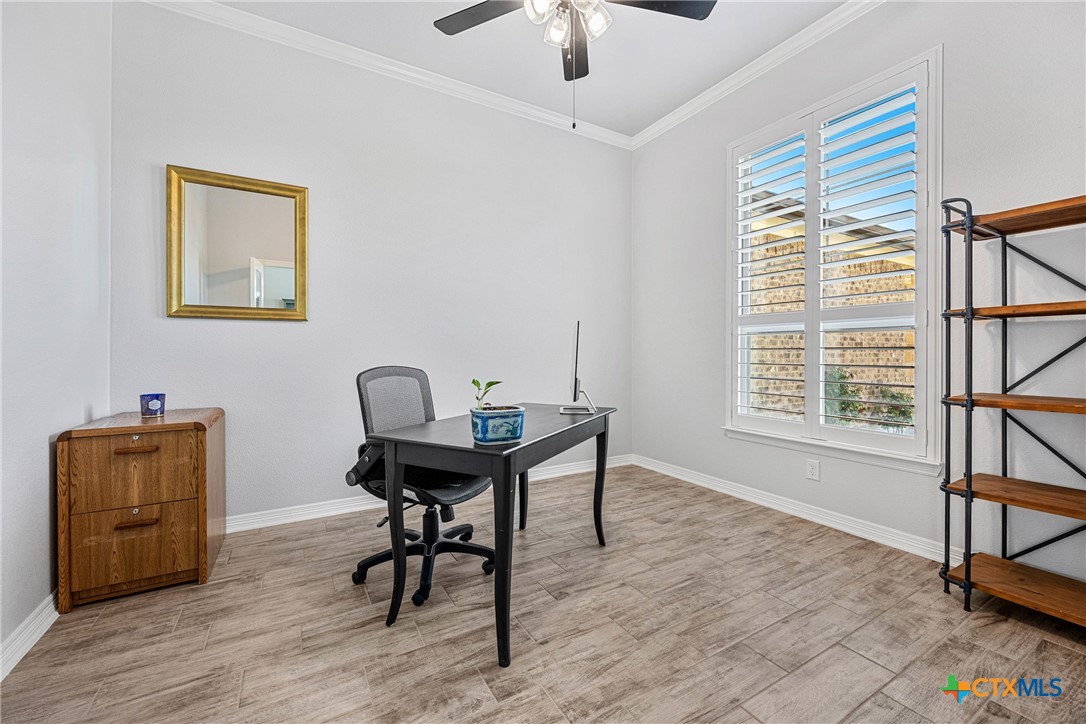 5513 Hollow Loop Salado, TX 76571 - Photo 16 of 37 a work room with furniture and window