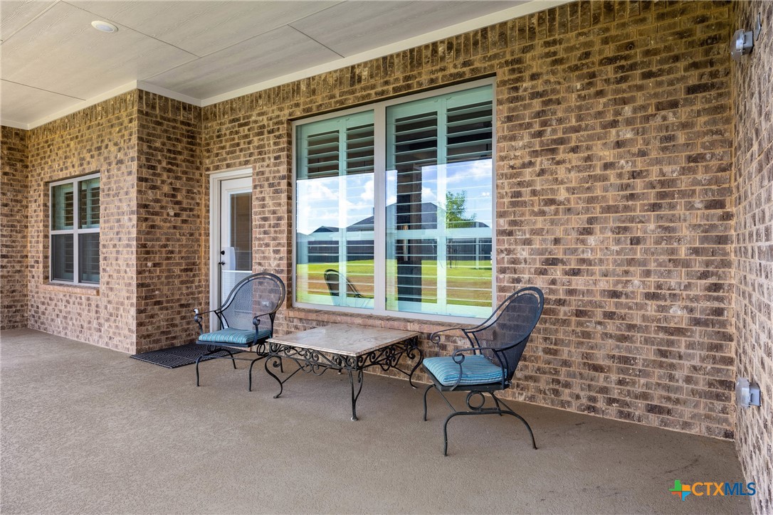 5513 Hollow Loop Salado, TX 76571 - Photo 28 of 37 a view of a workspace with furniture and a window