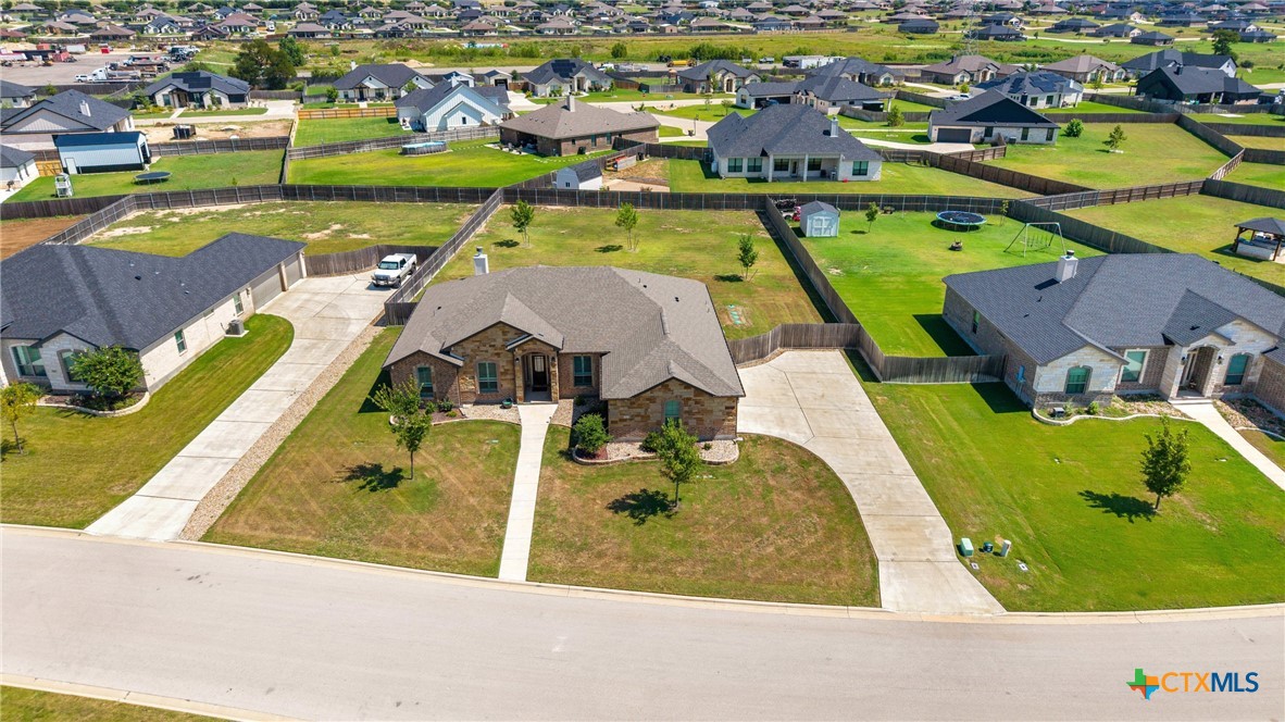 5513 Hollow Loop Salado, TX 76571 - Photo 30 of 37 an aerial view of residential houses with outdoor space