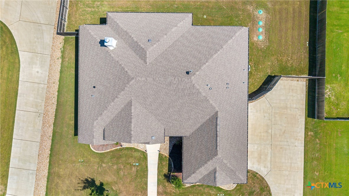 5513 Hollow Loop Salado, TX 76571 - Photo 33 of 37 a bathroom with a granite countertop shower and a sink