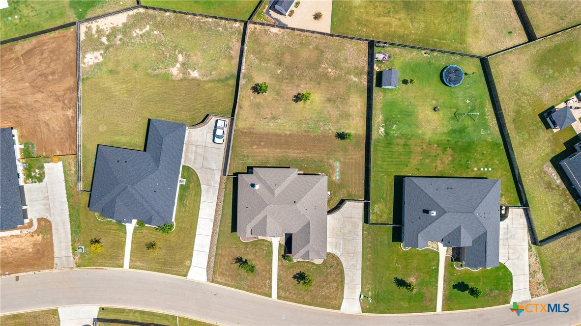 5513 Hollow Loop Salado, TX 76571 - Photo 34 of 37 an aerial view of residential houses with outdoor space