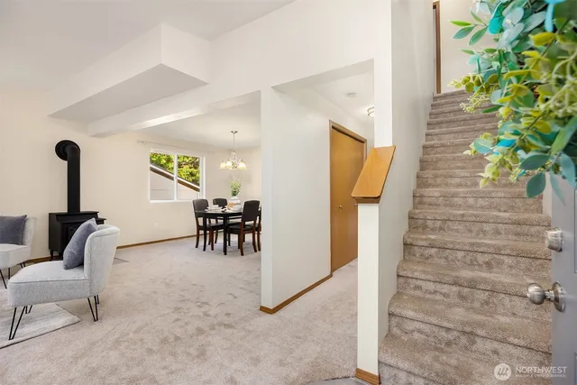 a view of livingroom with furniture and staircase