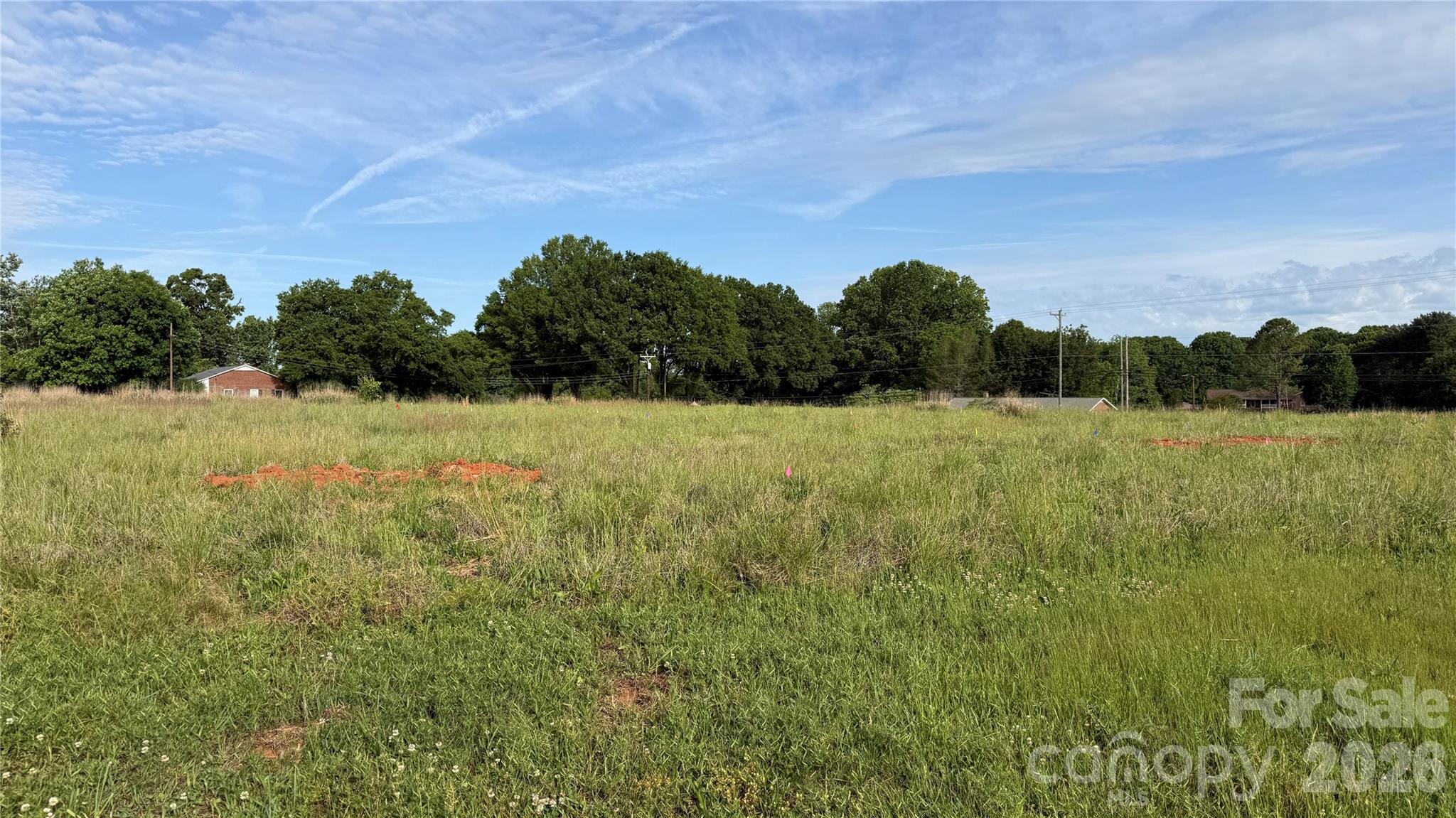 Tbd Caleb Setzer Road, Unit 3 Newton, NC 28658 - Photo 2 of 4 a view of a field of grass and trees