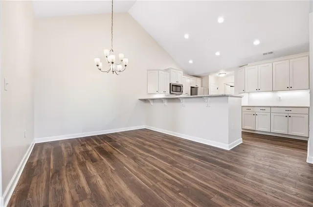 a view of cabinets and wooden floor
