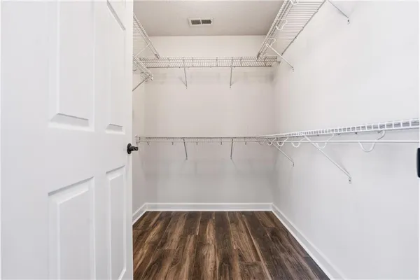 a view of a room with racks on the wall