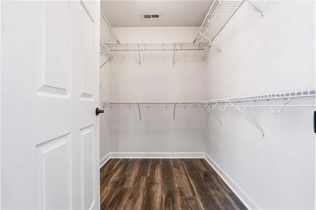 a view of a room with racks on the wall