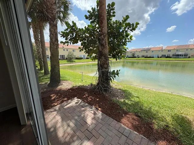 an aerial view of residential building and ocean
