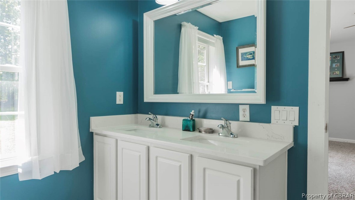 4555 Good Hope Road Lanexa, VA 23089 - Photo 23 of 49 En-suite master bath with New Quartz counter tops, New DBL square sinks & New faucets.