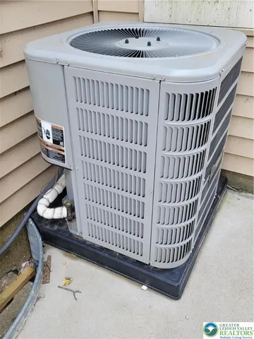a view of staircase with white walls and stairs