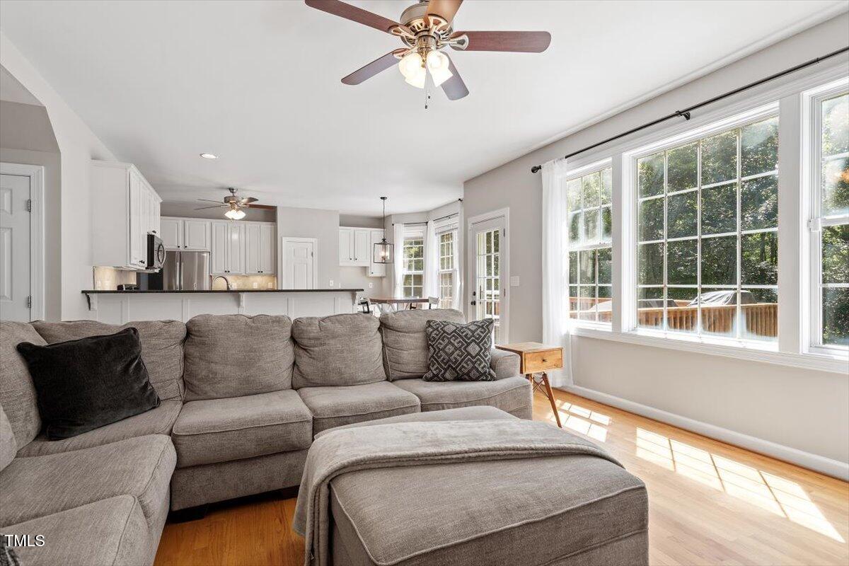5112 Solemn Grove Road Garner, NC 27529 - Photo 17 of 56 a living room with furniture and a large window