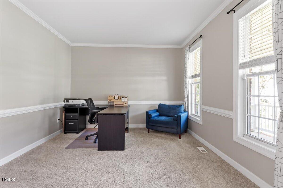 5112 Solemn Grove Road Garner, NC 27529 - Photo 29 of 56 a kitchen with a window and a counter top space
