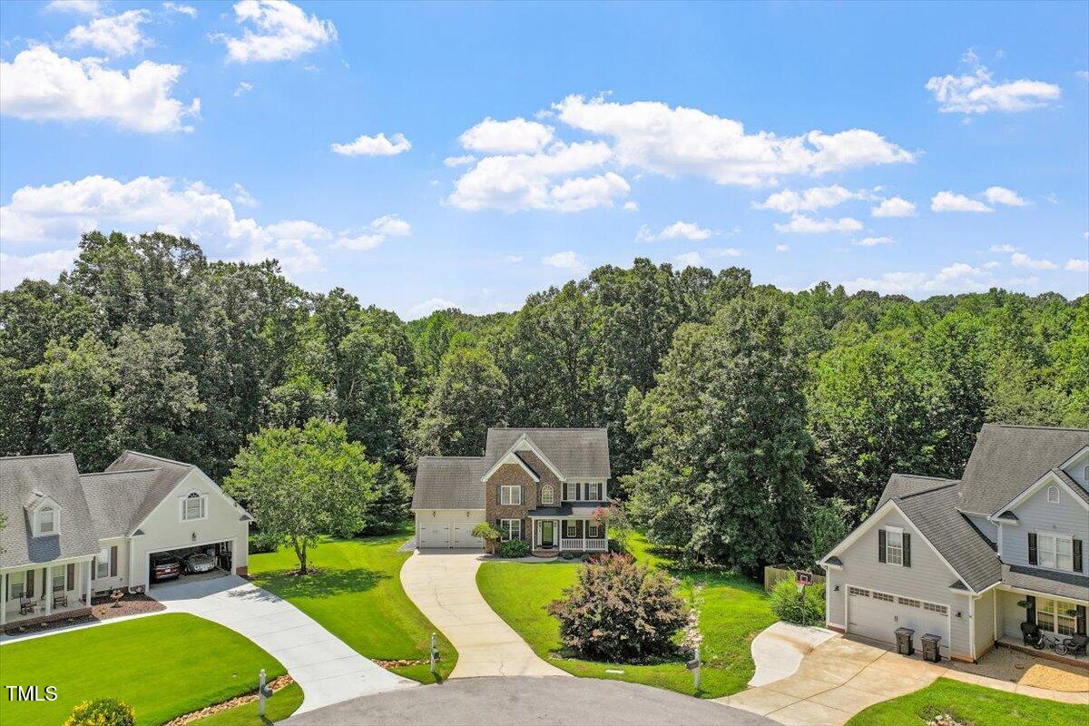 5112 Solemn Grove Road Garner, NC 27529 - Photo 37 of 56 a view of a house with a big yard
