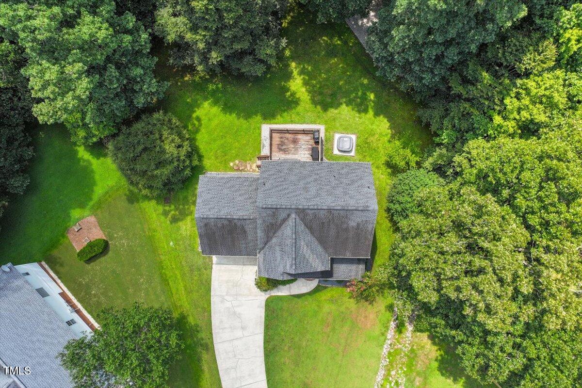 5112 Solemn Grove Road Garner, NC 27529 - Photo 45 of 56 an aerial view of a house with a yard