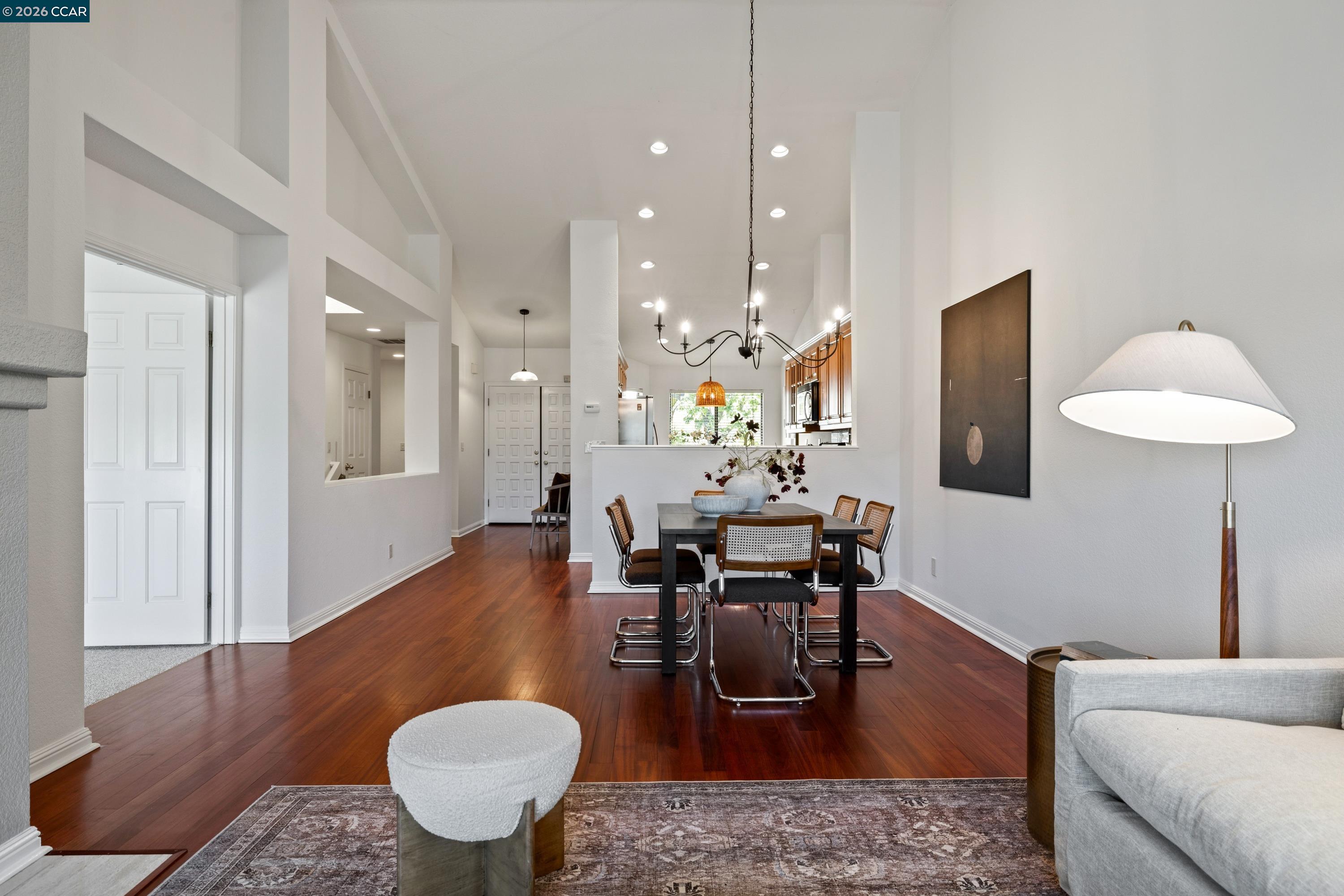 467 Beacon Ridge Lane Walnut Creek, CA 94597 - Photo 12 of 48 a view of a dining room with furniture and wooden floor