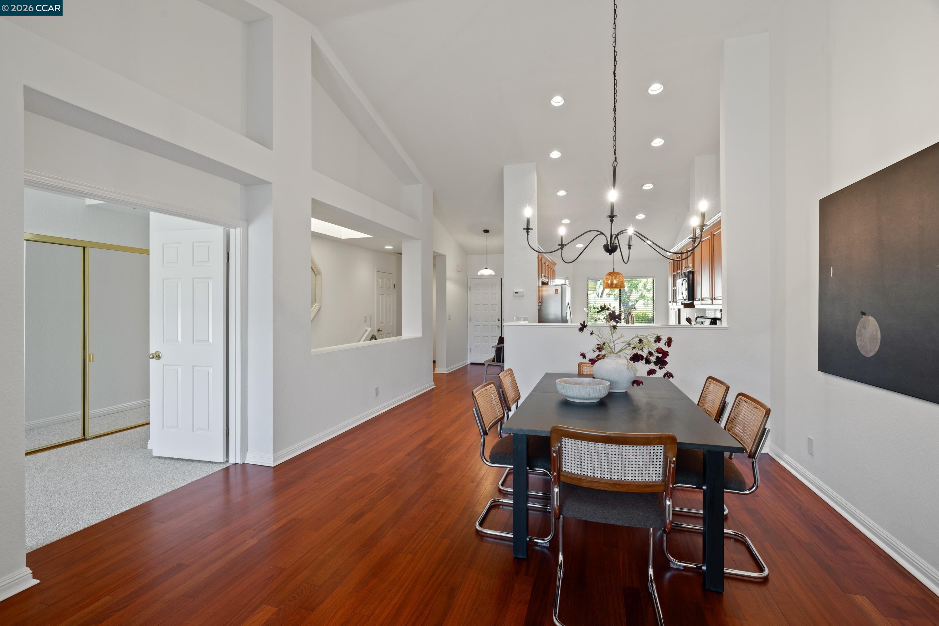 467 Beacon Ridge Lane Walnut Creek, CA 94597 - Photo 15 of 48 a view of a dining room with furniture and wooden floor