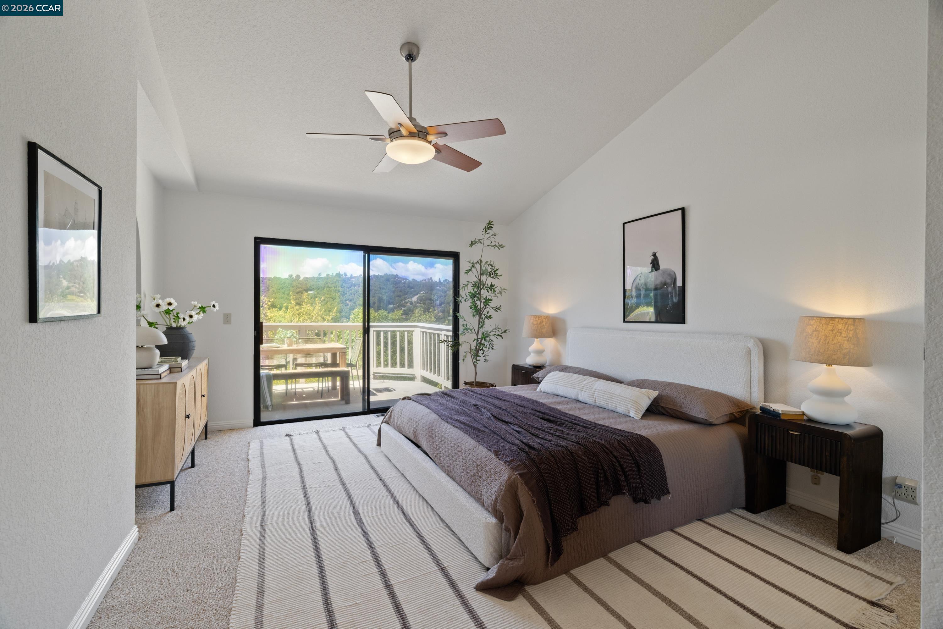 467 Beacon Ridge Lane Walnut Creek, CA 94597 - Photo 20 of 48 a bedroom with a large bed and a chandelier