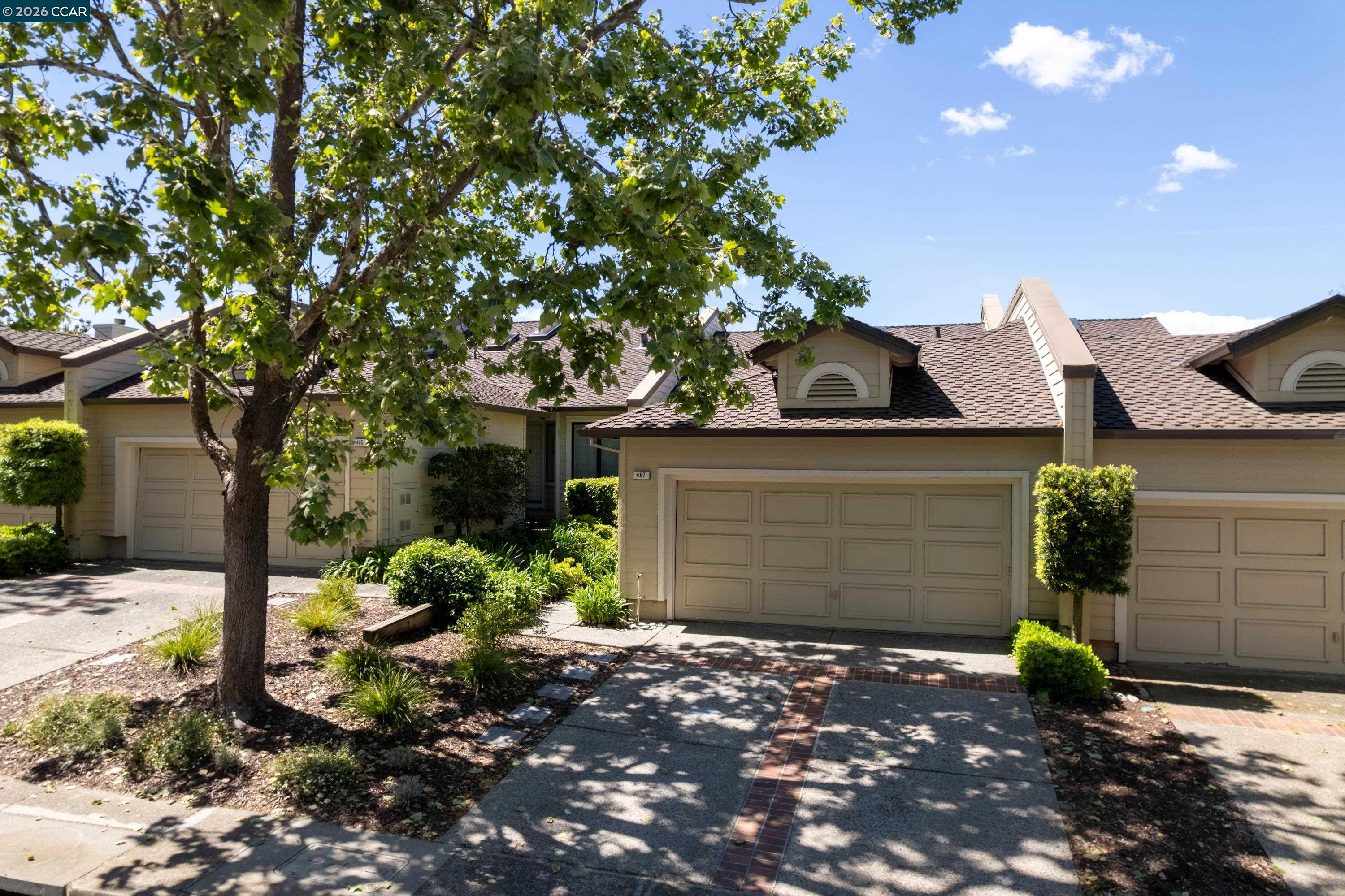 467 Beacon Ridge Lane Walnut Creek, CA 94597 - Photo 2 of 48 a view of a house with a yard and garage