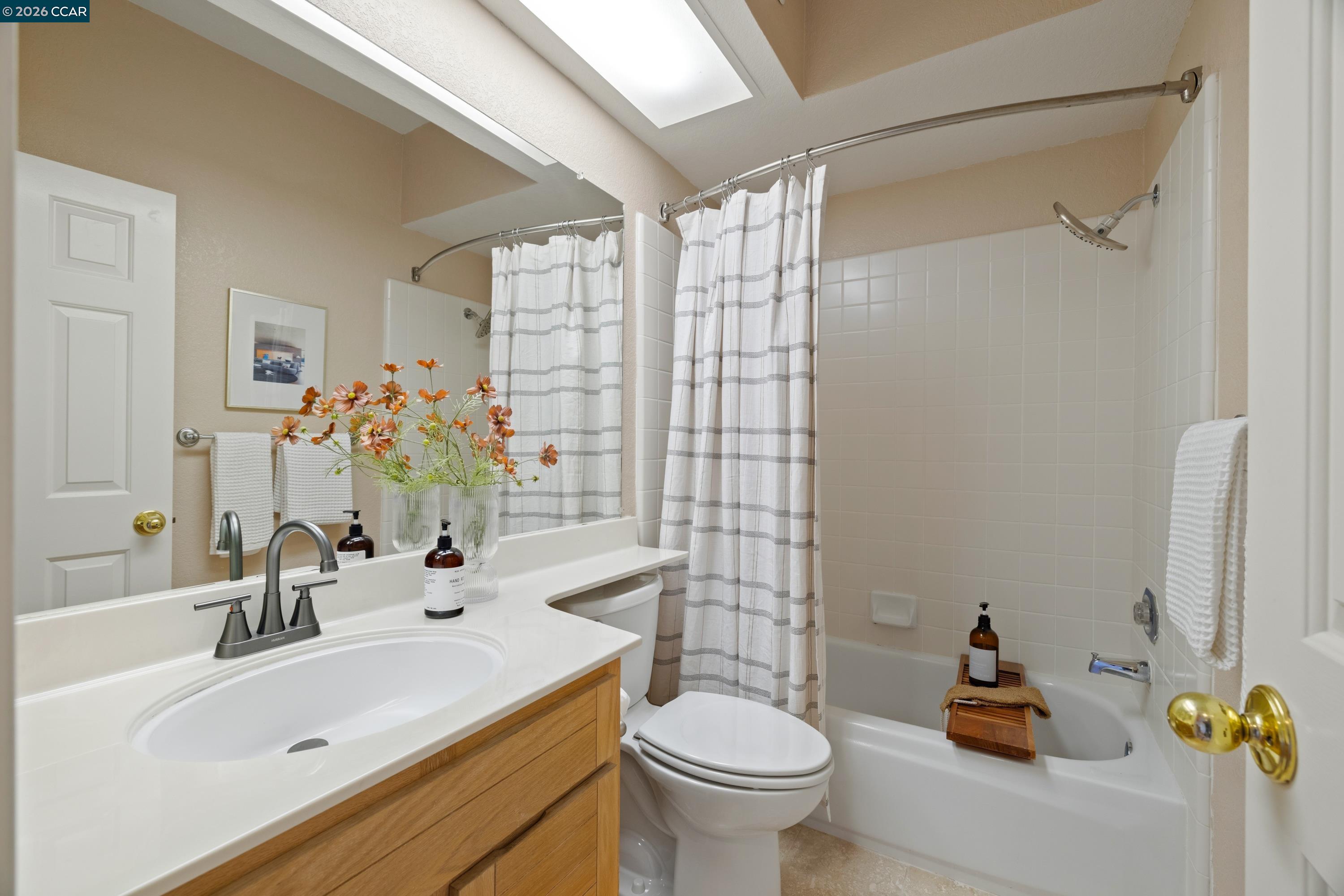 467 Beacon Ridge Lane Walnut Creek, CA 94597 - Photo 28 of 48 a bathroom with a sink toilet and shower