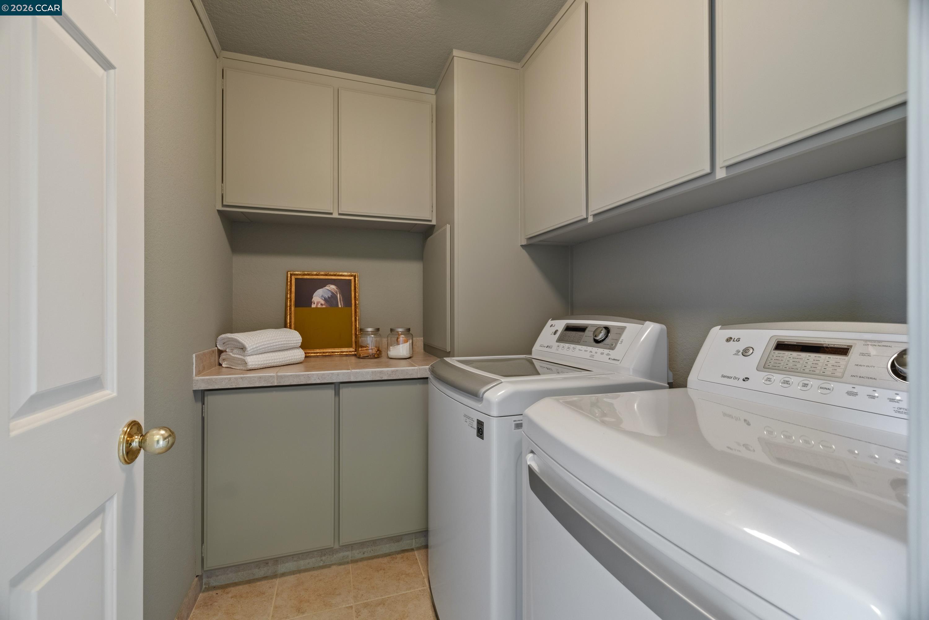 467 Beacon Ridge Lane Walnut Creek, CA 94597 - Photo 30 of 48 a utility room with dryer and washer
