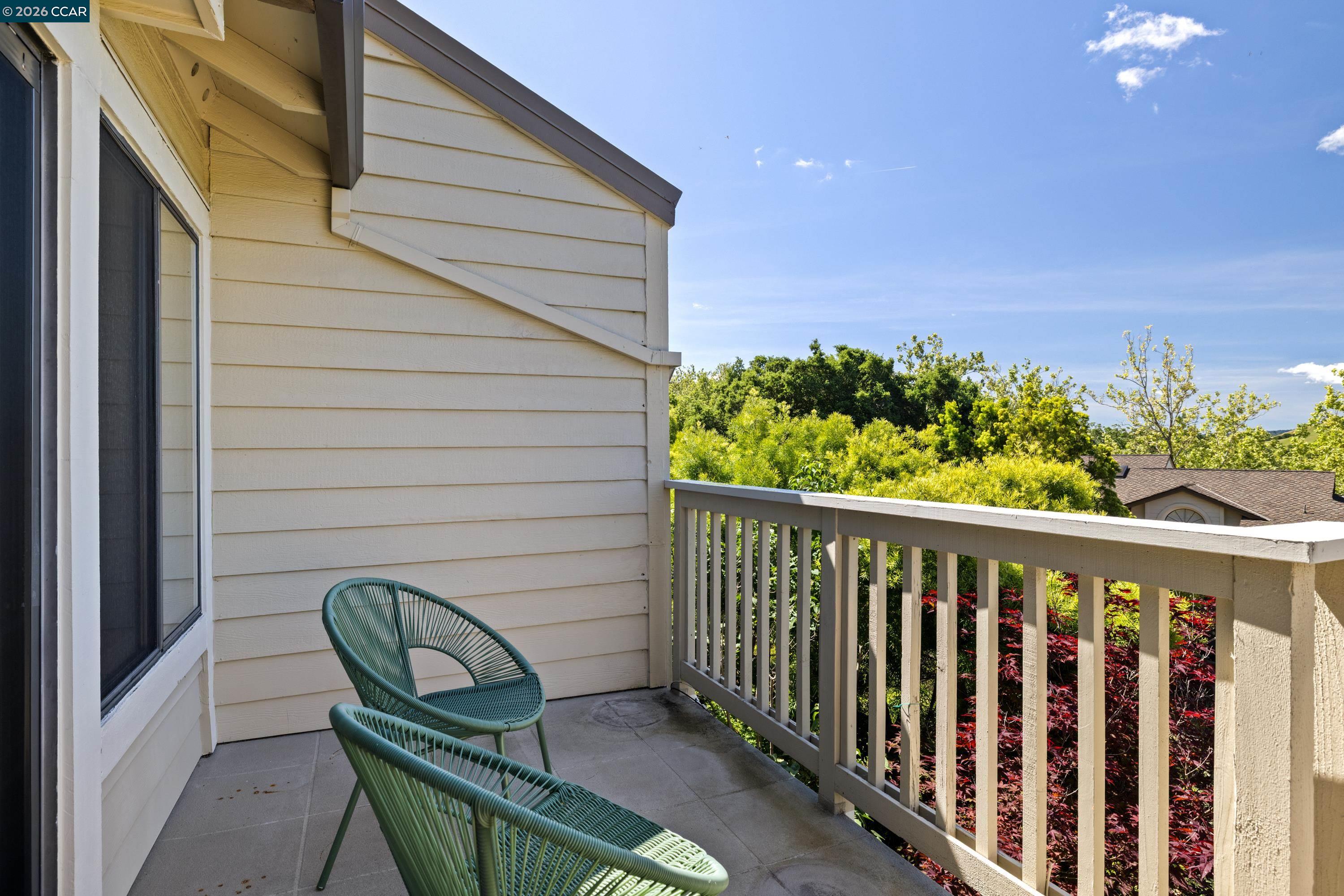 467 Beacon Ridge Lane Walnut Creek, CA 94597 - Photo 31 of 48 a view of a chair and table in the balcony