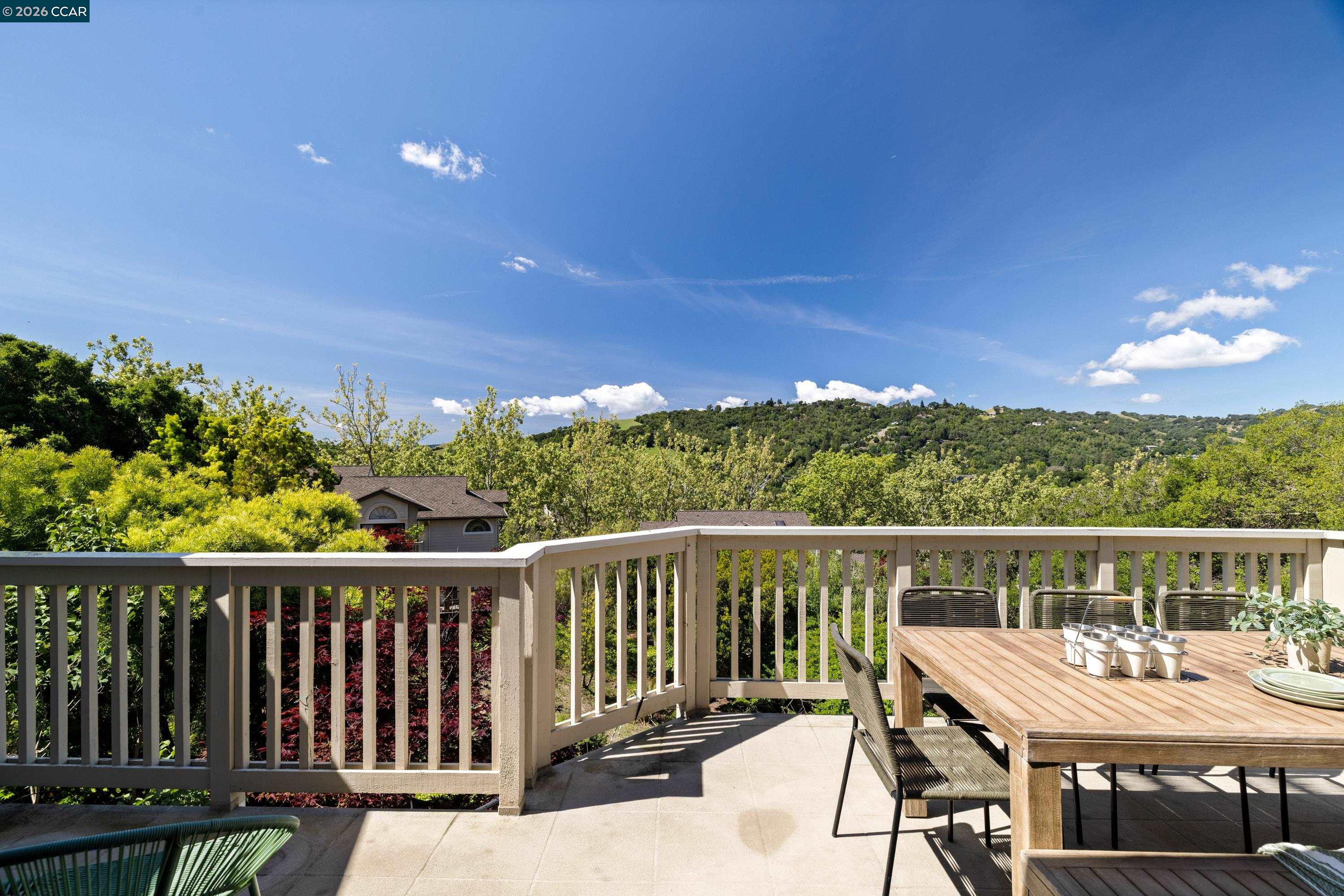 467 Beacon Ridge Lane Walnut Creek, CA 94597 - Photo 33 of 48 a view of a balcony with wooden floor and outdoor space