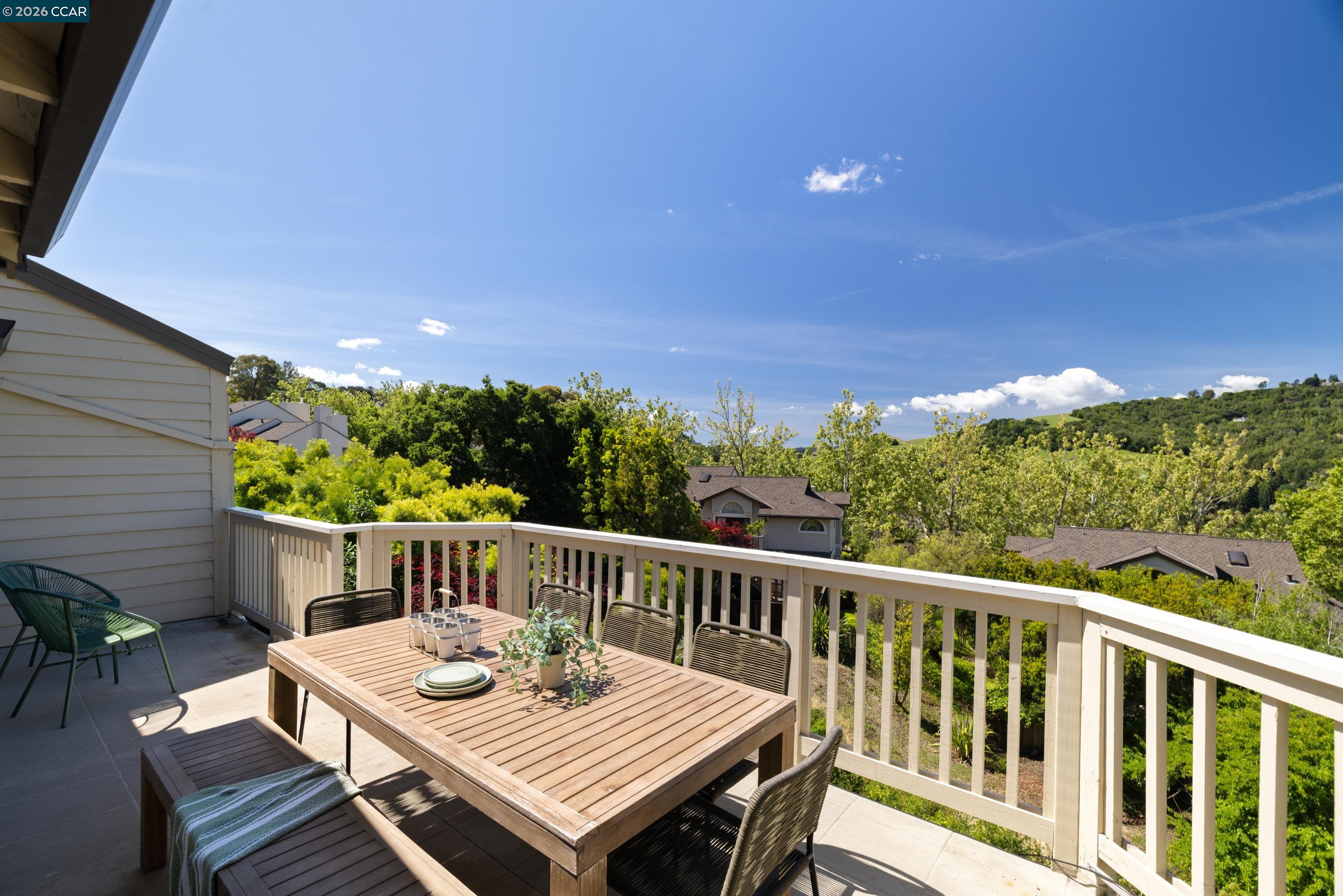 467 Beacon Ridge Lane Walnut Creek, CA 94597 - Photo 34 of 48 a view of a table and chairs on the roof deck