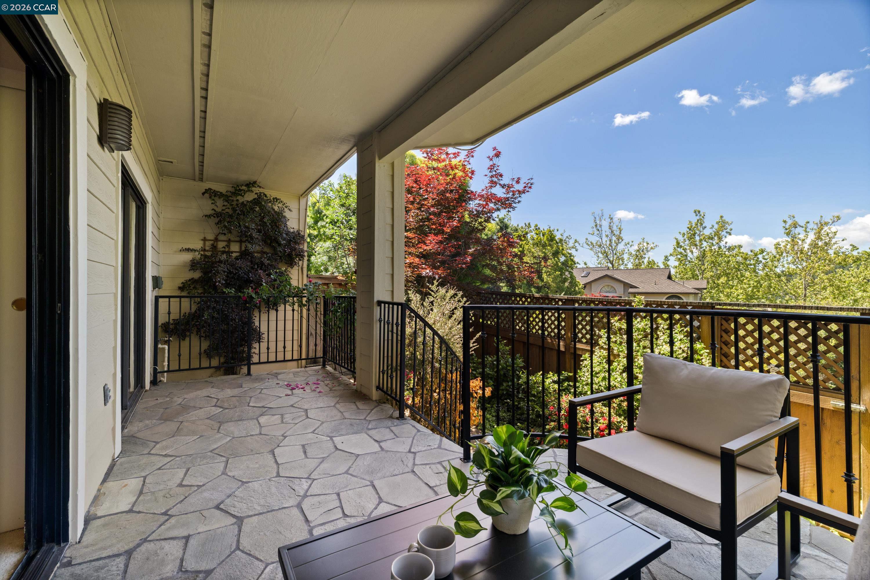 467 Beacon Ridge Lane Walnut Creek, CA 94597 - Photo 38 of 48 a view of a chairs and table in the balcony