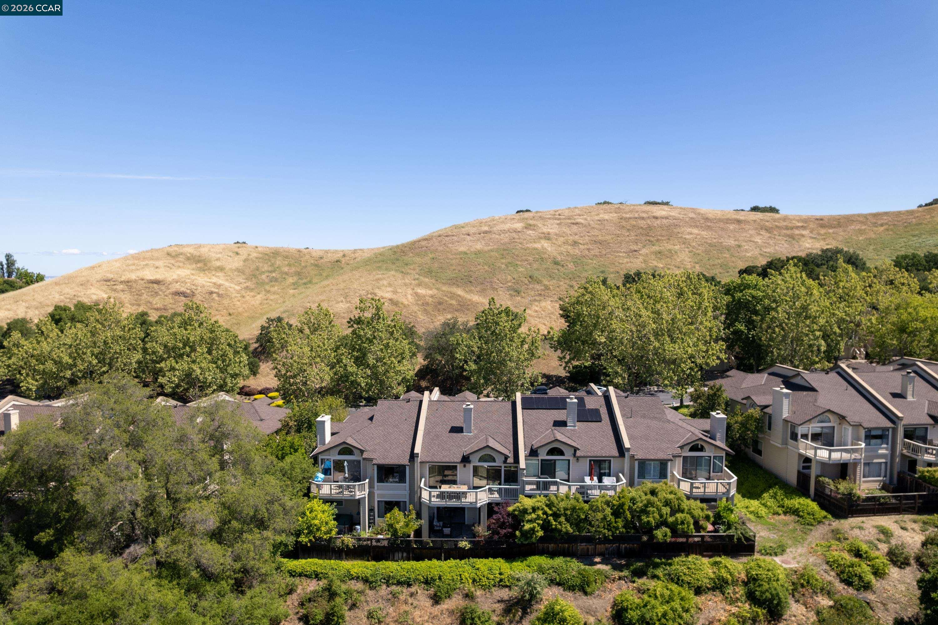 467 Beacon Ridge Lane Walnut Creek, CA 94597 - Photo 43 of 48 an aerial view of a house with a mountain in the background