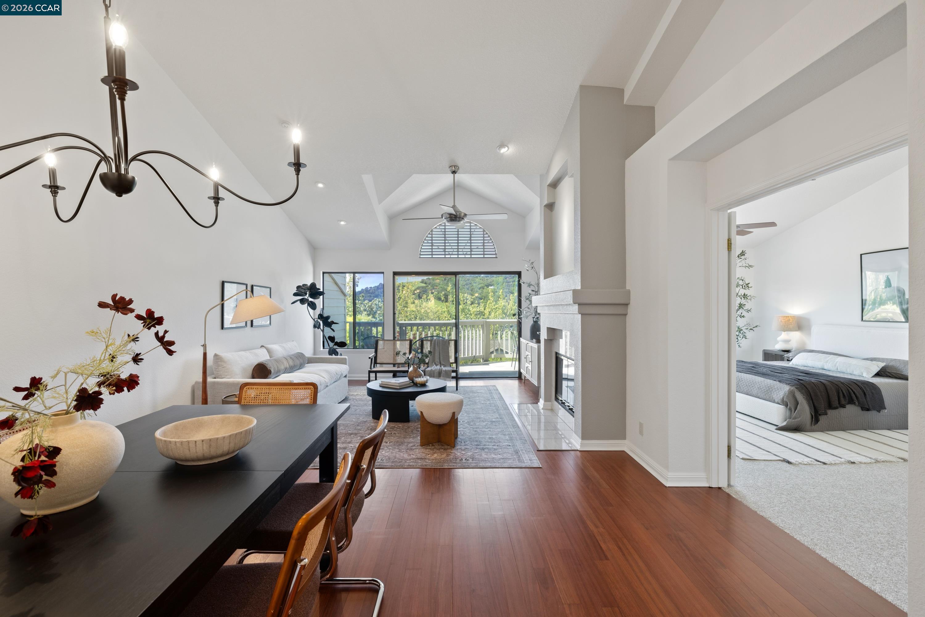467 Beacon Ridge Lane Walnut Creek, CA 94597 - Photo 7 of 48 a view of a dining room with furniture a chandelier and wooden floor