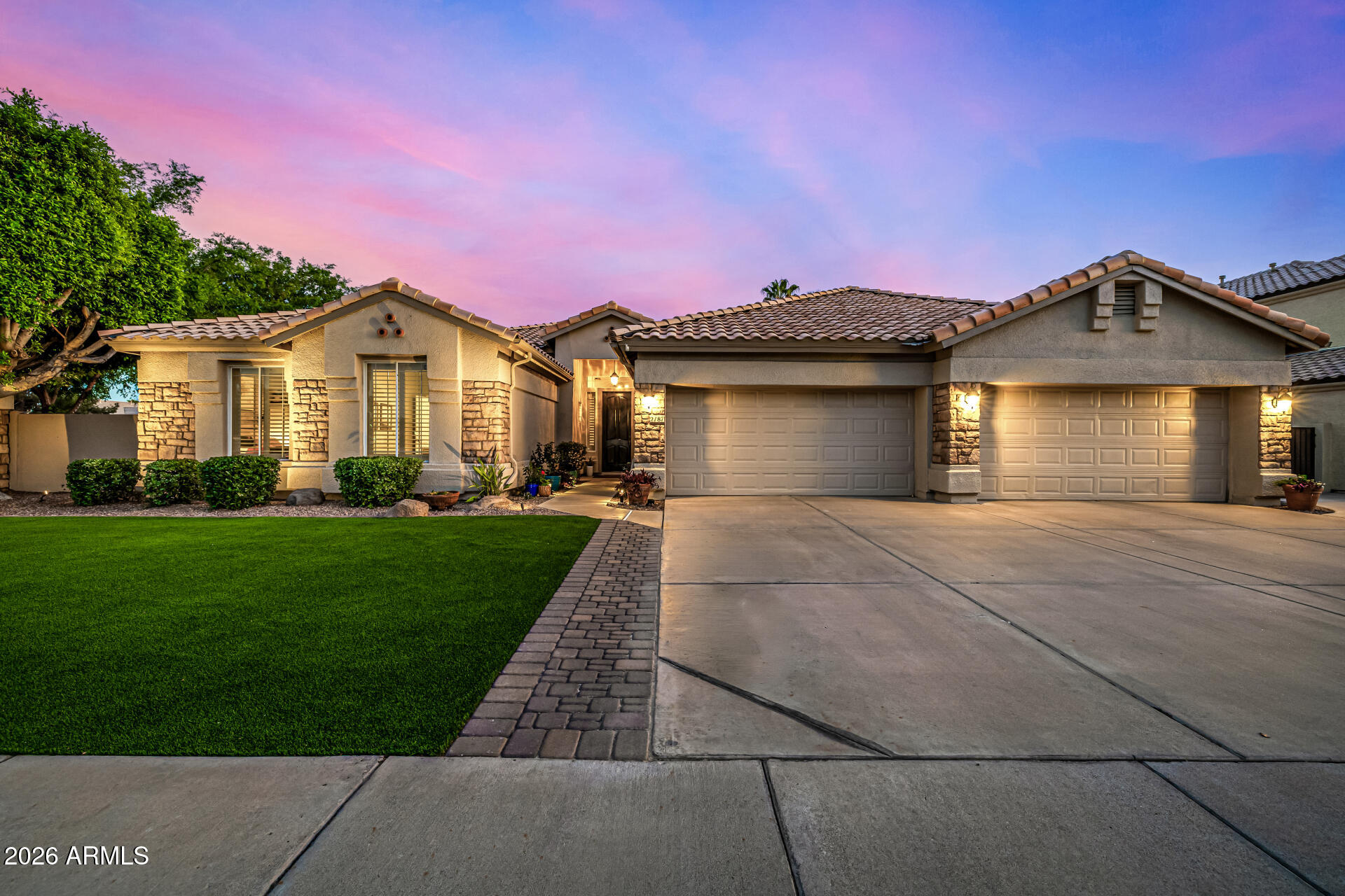 2187 East Finley Street Gilbert, AZ 85296 - Photo 1 of 89 a front view of a house with a yard and garage
