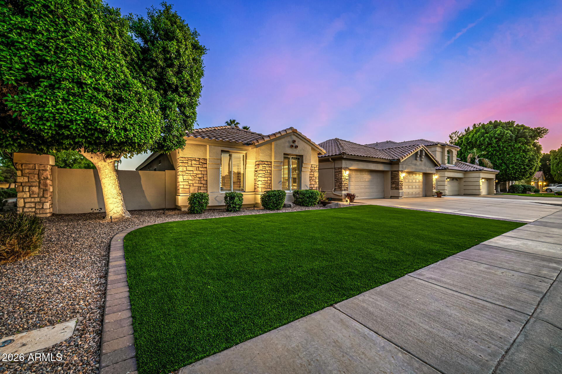 2187 East Finley Street Gilbert, AZ 85296 - Photo 2 of 89 a front view of a house with a yard