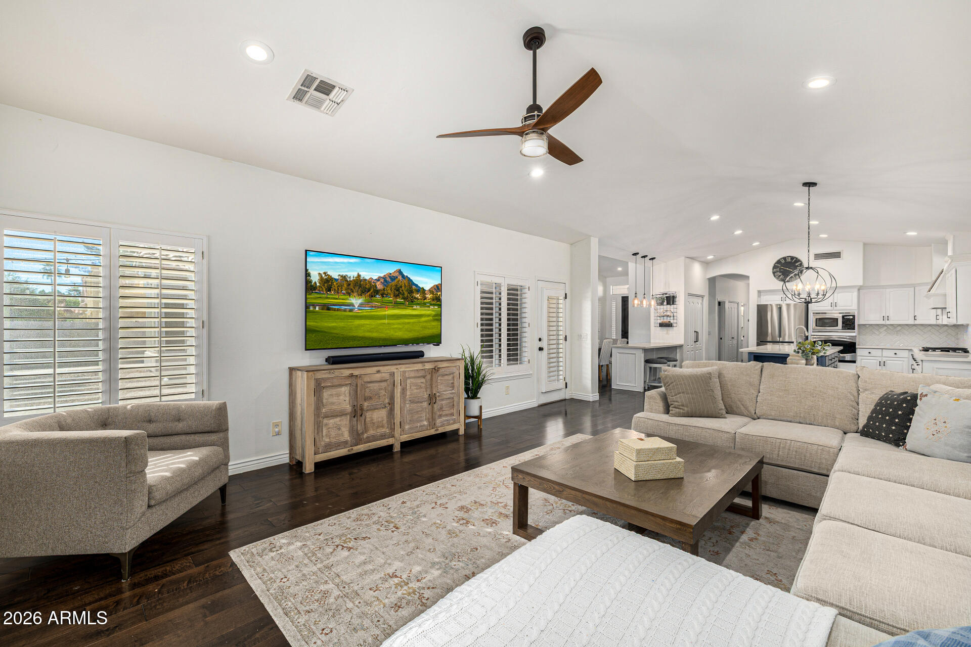 2187 East Finley Street Gilbert, AZ 85296 - Photo 23 of 89 a living room with furniture and a flat screen tv